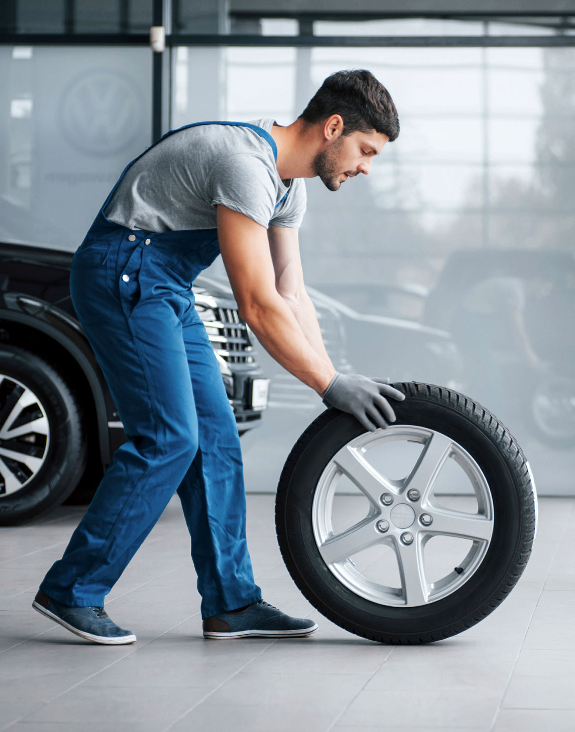 Man moving tire info-1